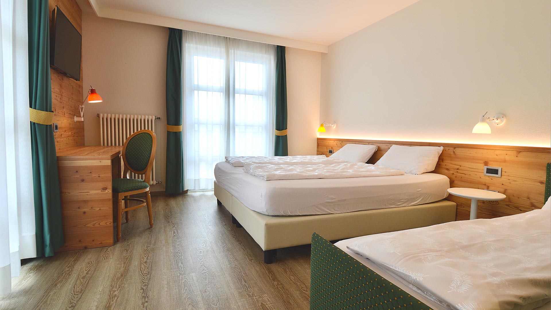 In unserer Unterkunft im Val di Sole können Sie sich im gemütlichen und eleganten Design unserer Zimmer entspannen.